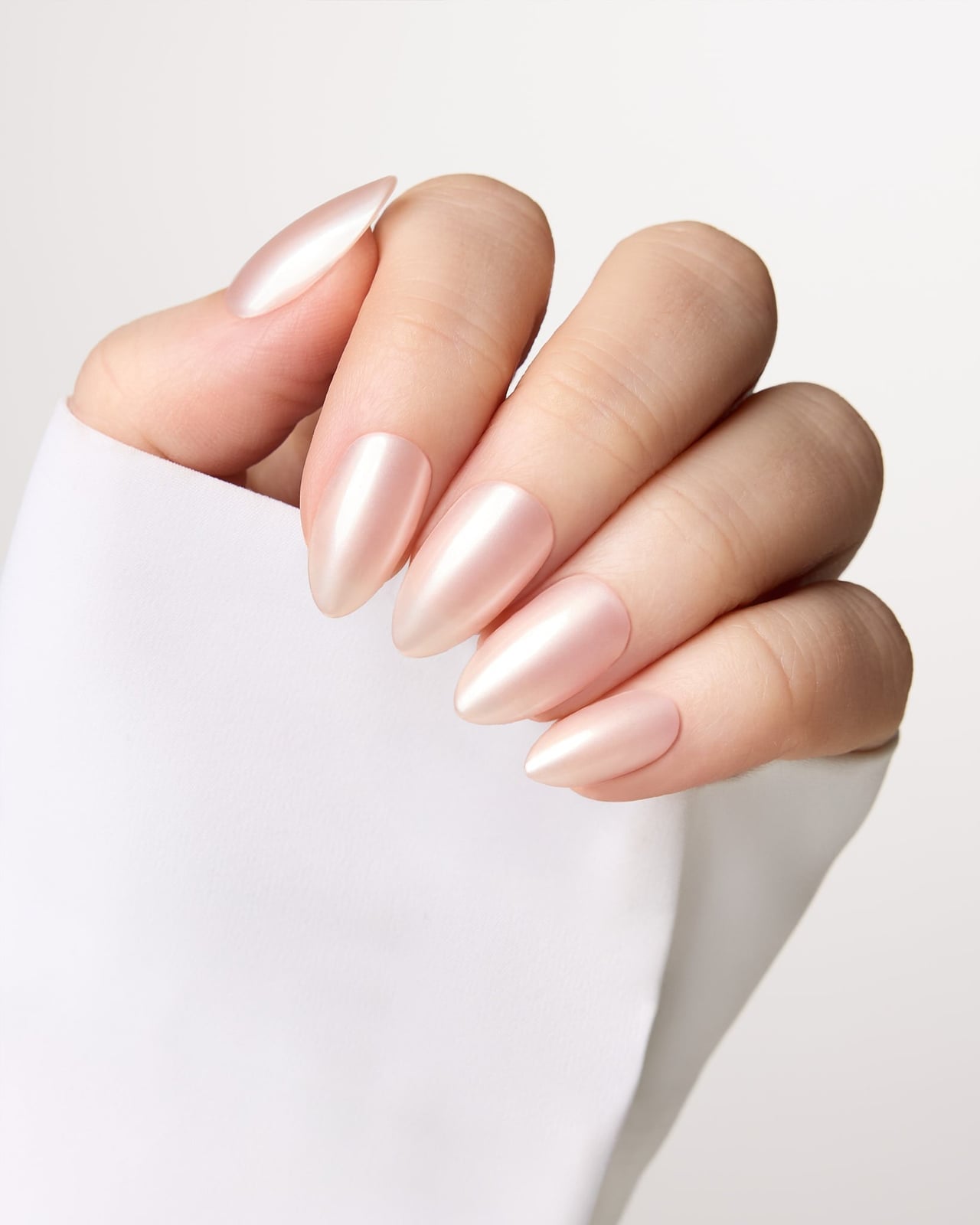 Medium Almond Pale Pink Shimmer Nails, Highlighting The Smooth Medium Almond Pale Pink Shimmer Nails, Highlighting The Smooth — Glazed Donut Nails 2027