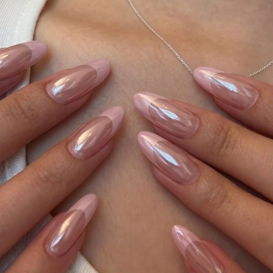 Medium Oval Sheer Pink Pearlescent French Tip Nails, Close-Up Take Medium Oval Sheer Pink Pearlescent French Tip Nails, Close-Up Take — Glazed Donut Nails 2027