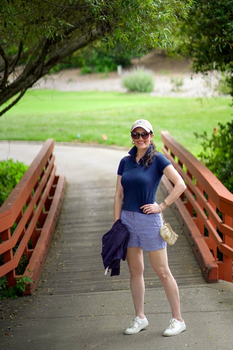 Navy polo with blue and white patterned shorts Navy polo with blue and white patterned shorts — Golf Tournament Outfits 2027