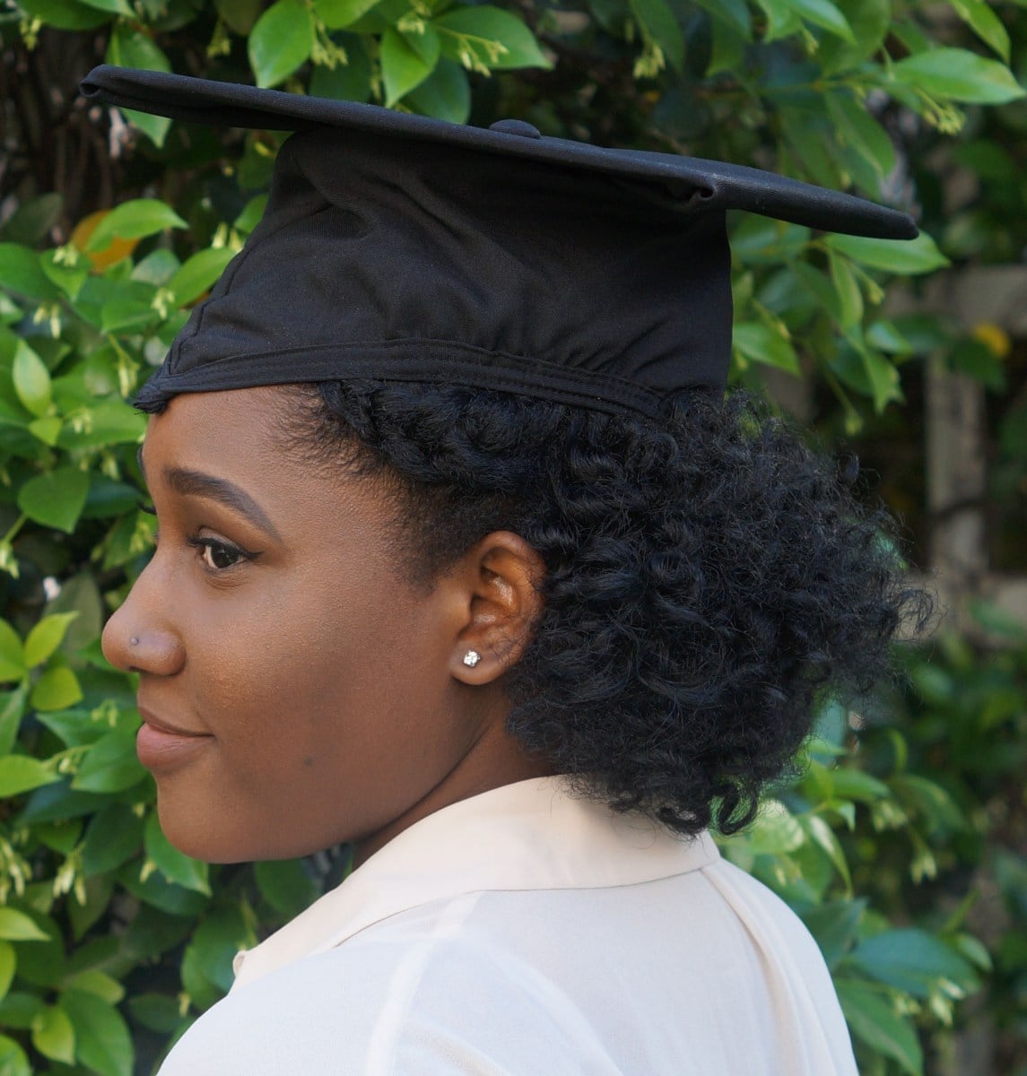 Shoulder Length Defined Curls Pulled Back Shoulder Length Defined Curls Pulled Back — Graduation Hairstyles 2027 with Cap