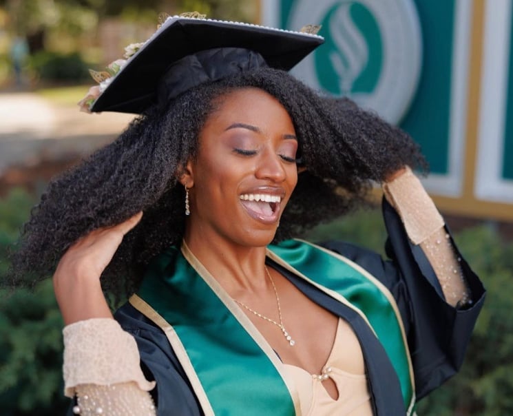 Thick Dark Brown Blowout With Loose Curls Thick Dark Brown Blowout With Loose Curls — Graduation Hairstyles 2027 with Cap