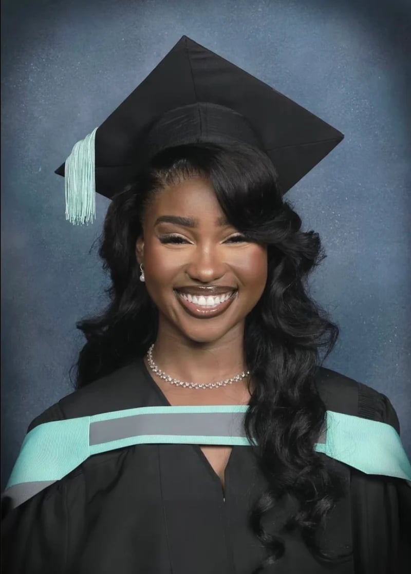 Voluminous Black Waves With Side Part Voluminous Black Waves With Side Part — Graduation Hairstyles 2027 with Cap