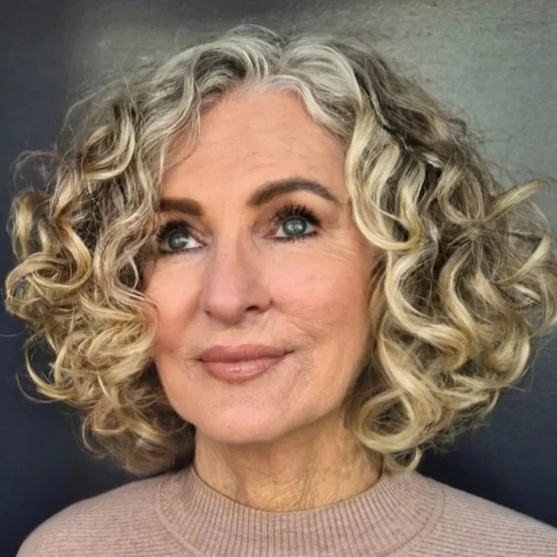 Collarbone Bob With Voluminous Curls and Gray Roots Collarbone Bob With Voluminous Curls and Gray Roots — Haircuts 2027 for Women Over 60