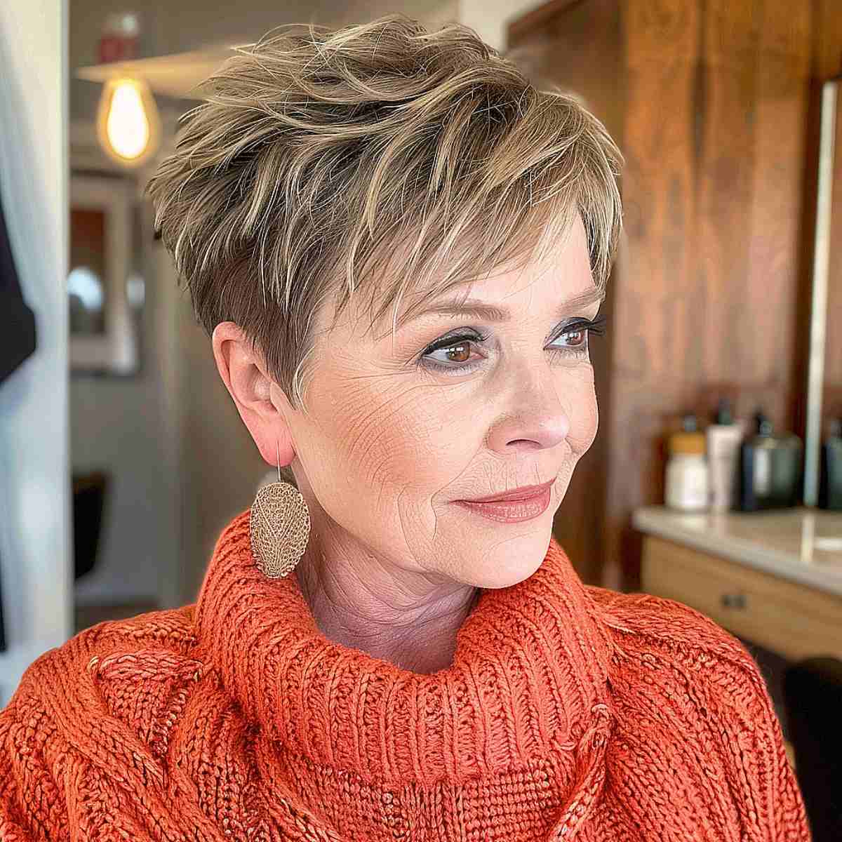 Ear Length Choppy Pixie With Sun-Kissed Highlights Ear Length Choppy Pixie With Sun-Kissed Highlights — Haircuts 2027 for Women Over 60