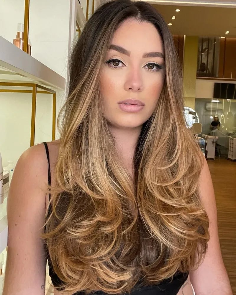 Mid-Back Layered Waves With Curtain Bangs, Creating Dimension — Hairstyles 2027 for Long Faces