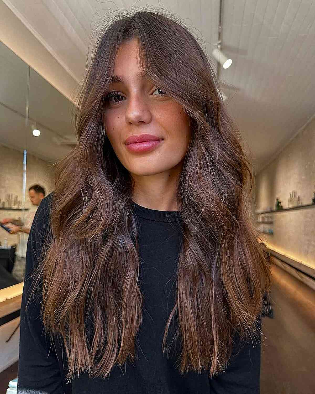 Mid-Back Flowing Waves With No Bangs, Lighter Brown Highlights — Hairstyles 2027 for Long Faces