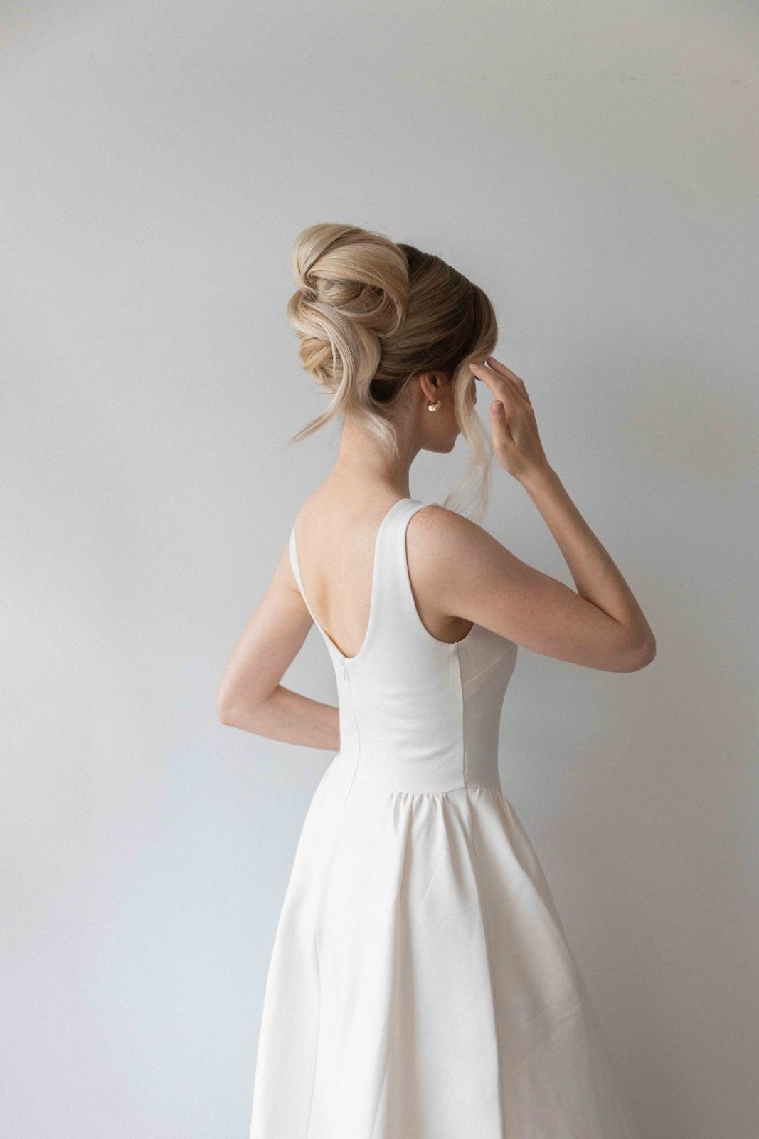 Voluminous Blonde Twisted Updo Voluminous Blonde Twisted Updo — Hairstyles 2027 for Long Neck