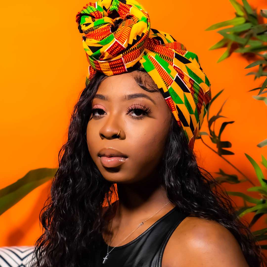 Long Wavy Hair With Kente Cloth Wrap Long Wavy Hair With Kente Cloth Wrap — Head Wrap Hairstyles 2027
