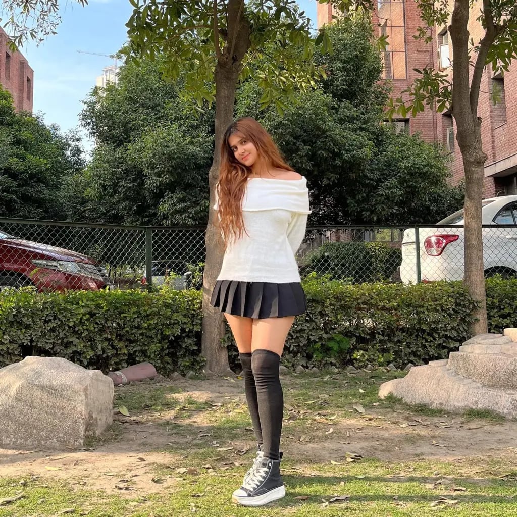 Off-Shoulder White Sweater With Pleated Mini Skirt Off-Shoulder White Sweater With Pleated Mini Skirt — High Top Converse Outfits 2027