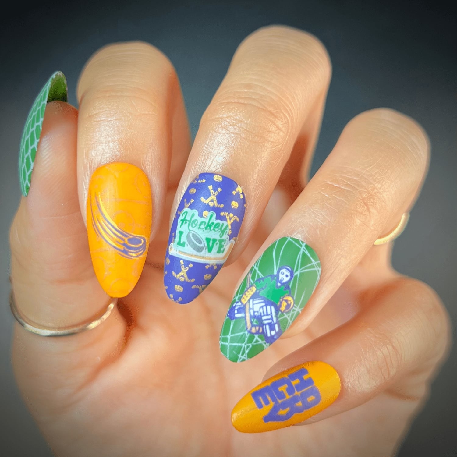 Yellow Purple Green Hockey Player Almond Nails Yellow Purple Green Hockey Player Almond Nails — Hockey Nails 2027