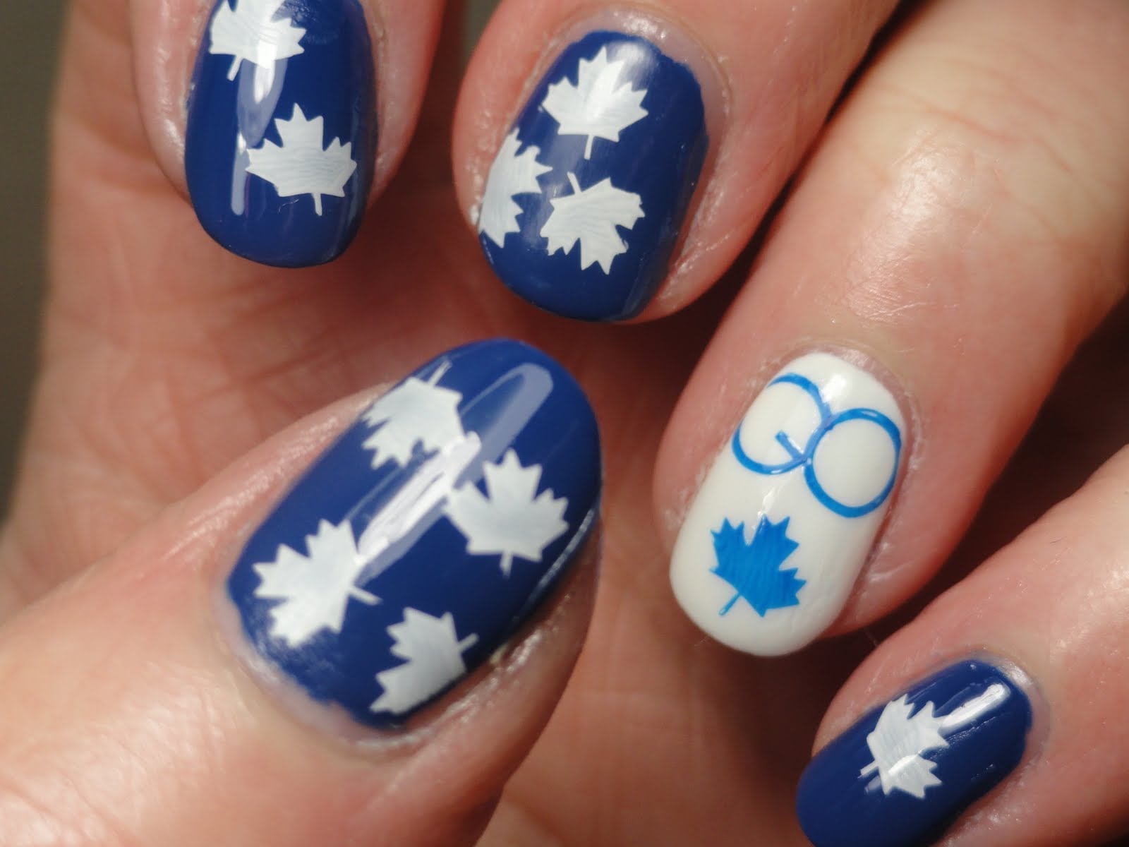 Short Oval Navy Blue Maple Leaf Olympic Rings Nails Short Oval Navy Blue Maple Leaf Olympic Rings Nails — Hockey Nails 2027