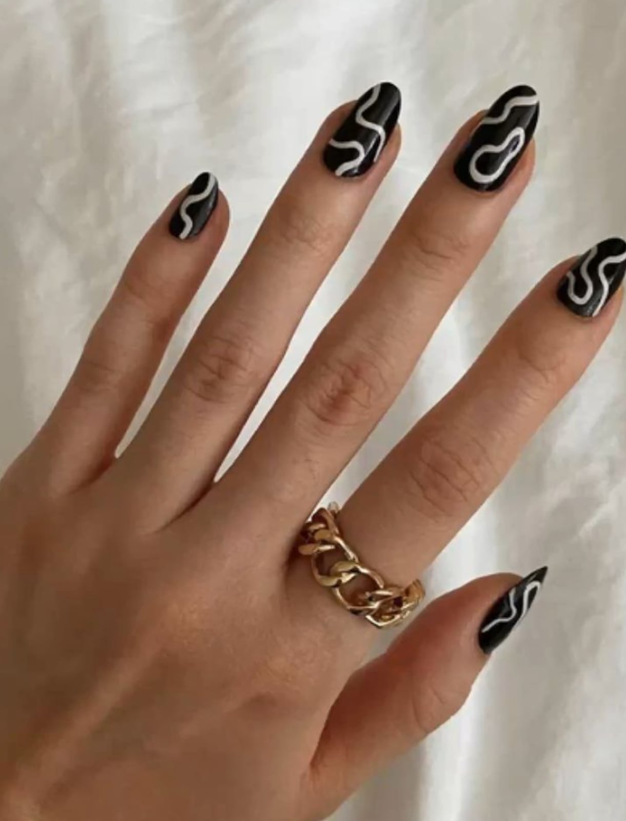 Glossy Black Almond Nails with White Swirls Glossy Black Almond Nails with White Swirls — Jet Black Nails 2027