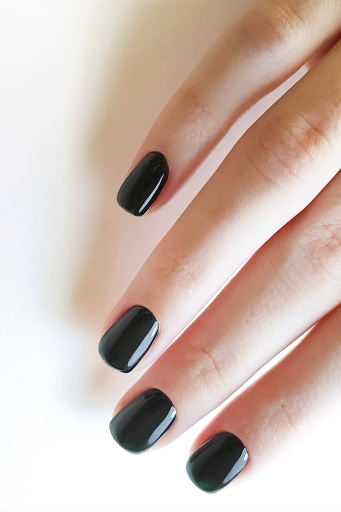 Glossy Jet Black Short Square Fingernails, Resting On A Plain Glossy Jet Black Short Square Fingernails, Resting On A Plain — Jet Black Nails 2027