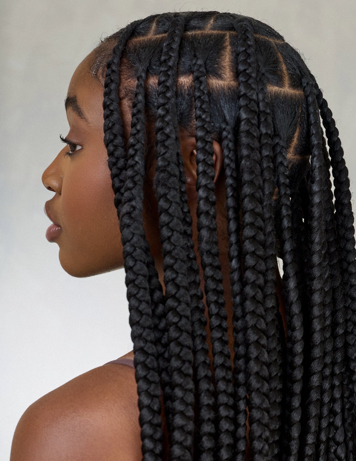 Mid-Back Jumbo Box Braids With Wavy Texture — Jumbo Braided Hairstyles 2027