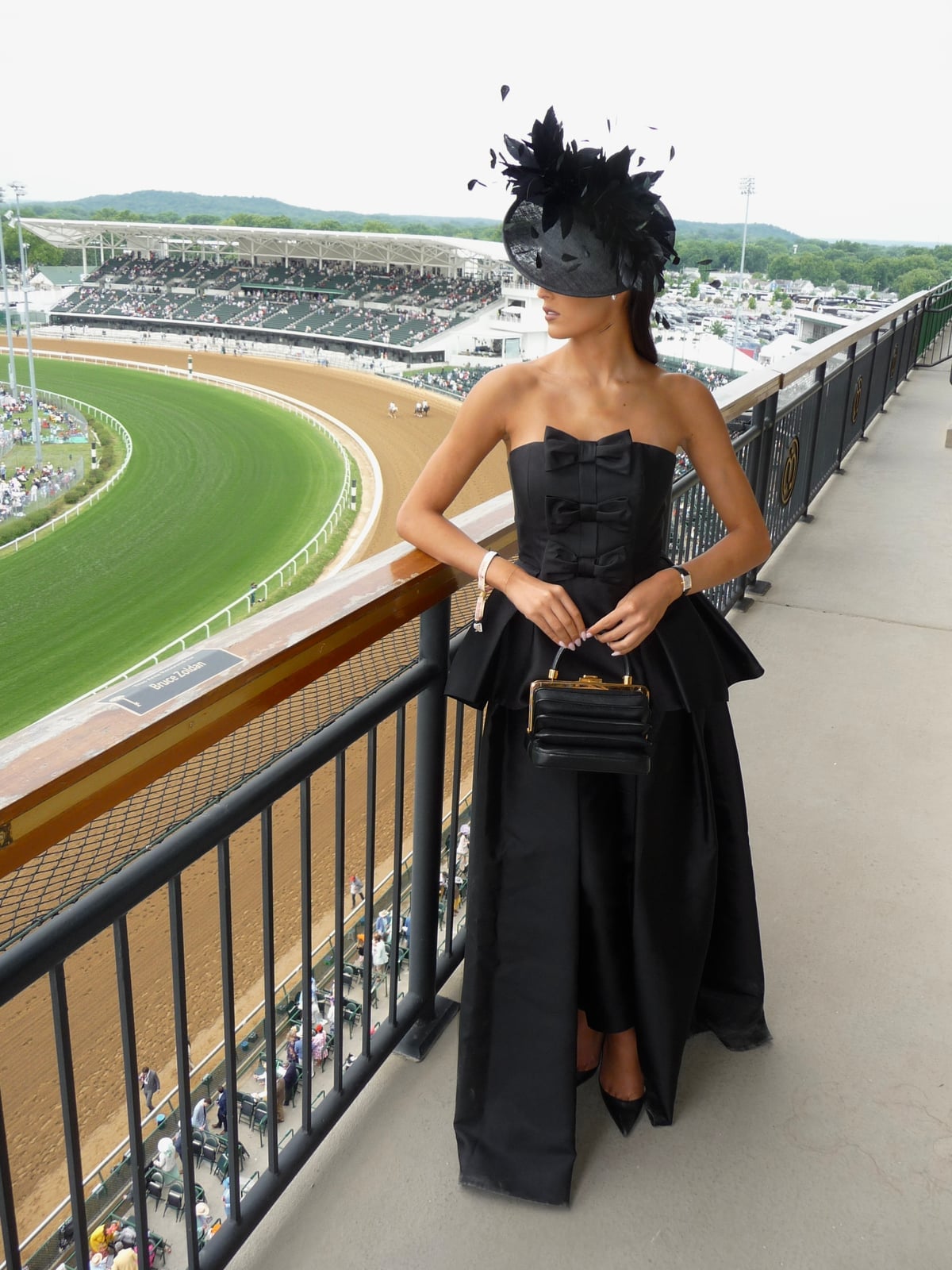 Black Strapless Gown with Feathered Headpiece — Kentucky Derby Dress 2027 with Hat
