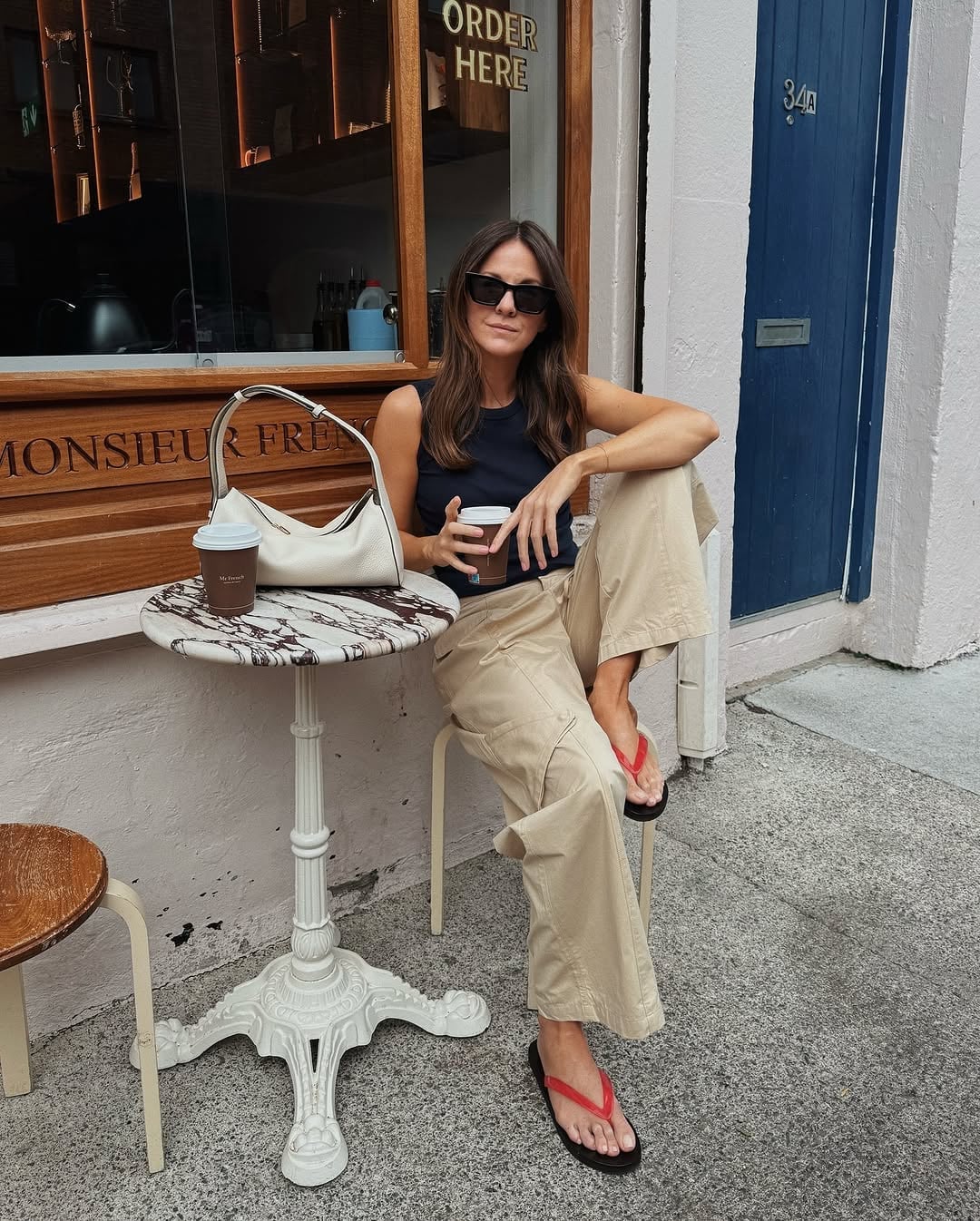 Beige Cargo Trousers With Navy Tank Top Beige Cargo Trousers With Navy Tank Top — Khaki Pants Outfits 2027