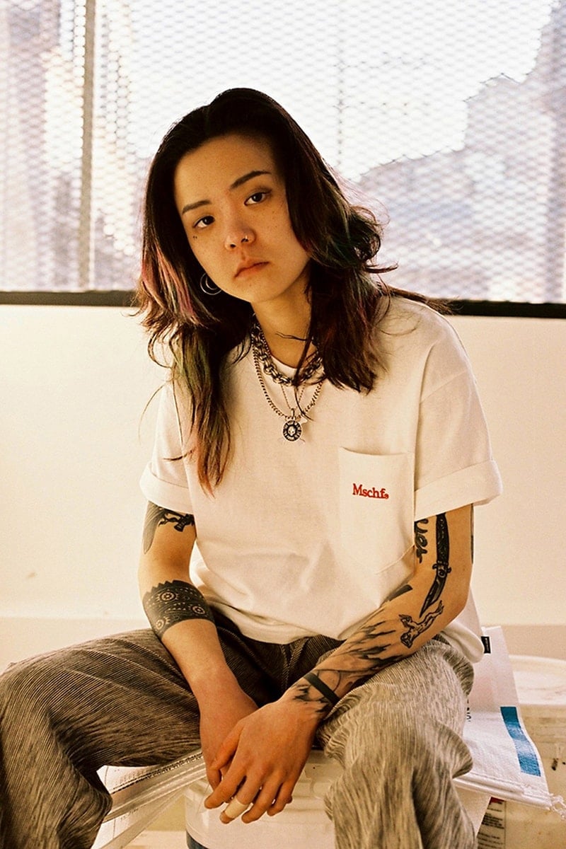 Graphic T-Shirt With Relaxed Fit Trousers, Close-Up Take Graphic T-Shirt With Relaxed Fit Trousers, Close-Up Take — Korean Streetwear Outfits 2027