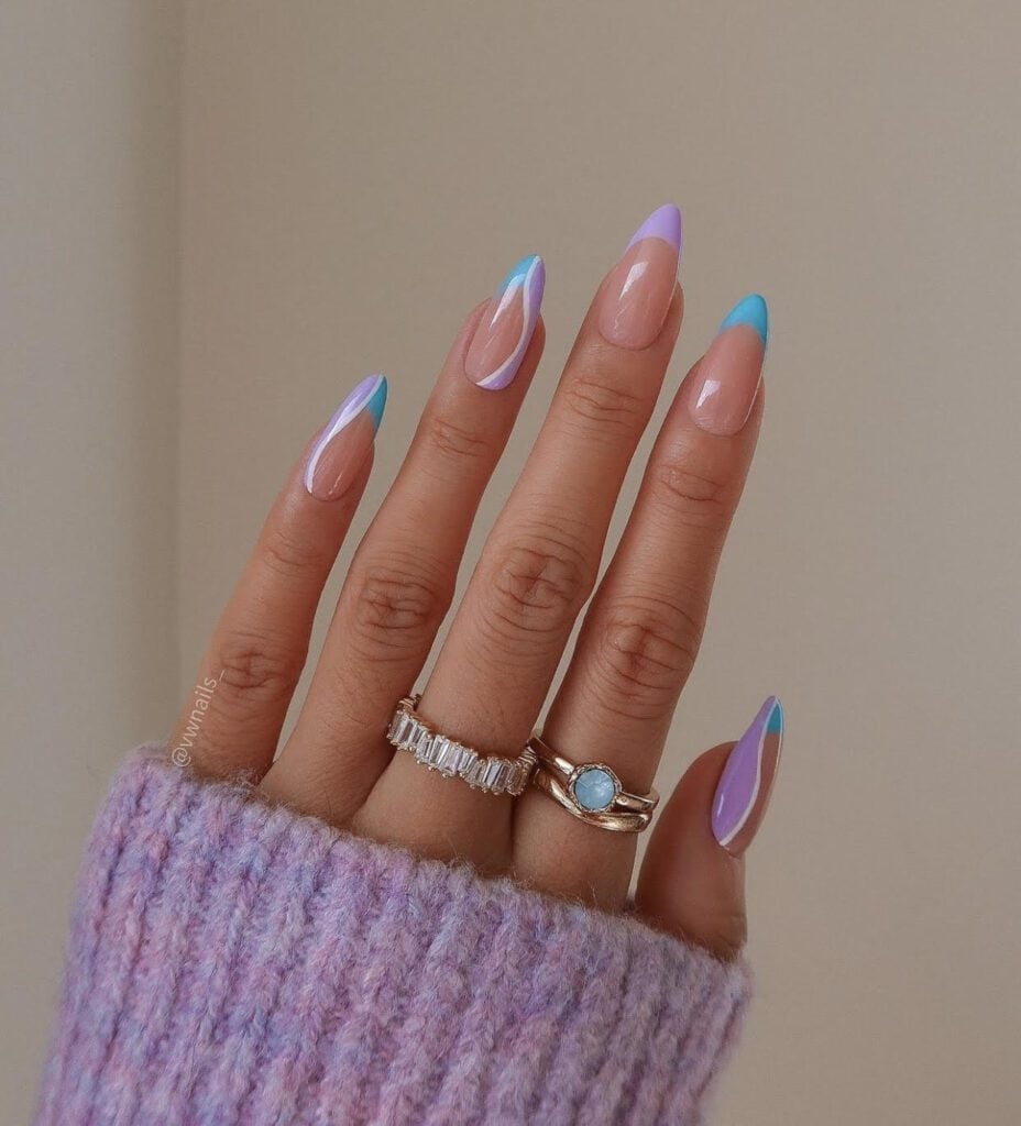 Medium-Long Almond Nude Light Blue Pastel Purple Abstract French Tip Medium-Long Almond Nude Light Blue Pastel Purple Abstract French Tip — Line Abstract Nails 2027