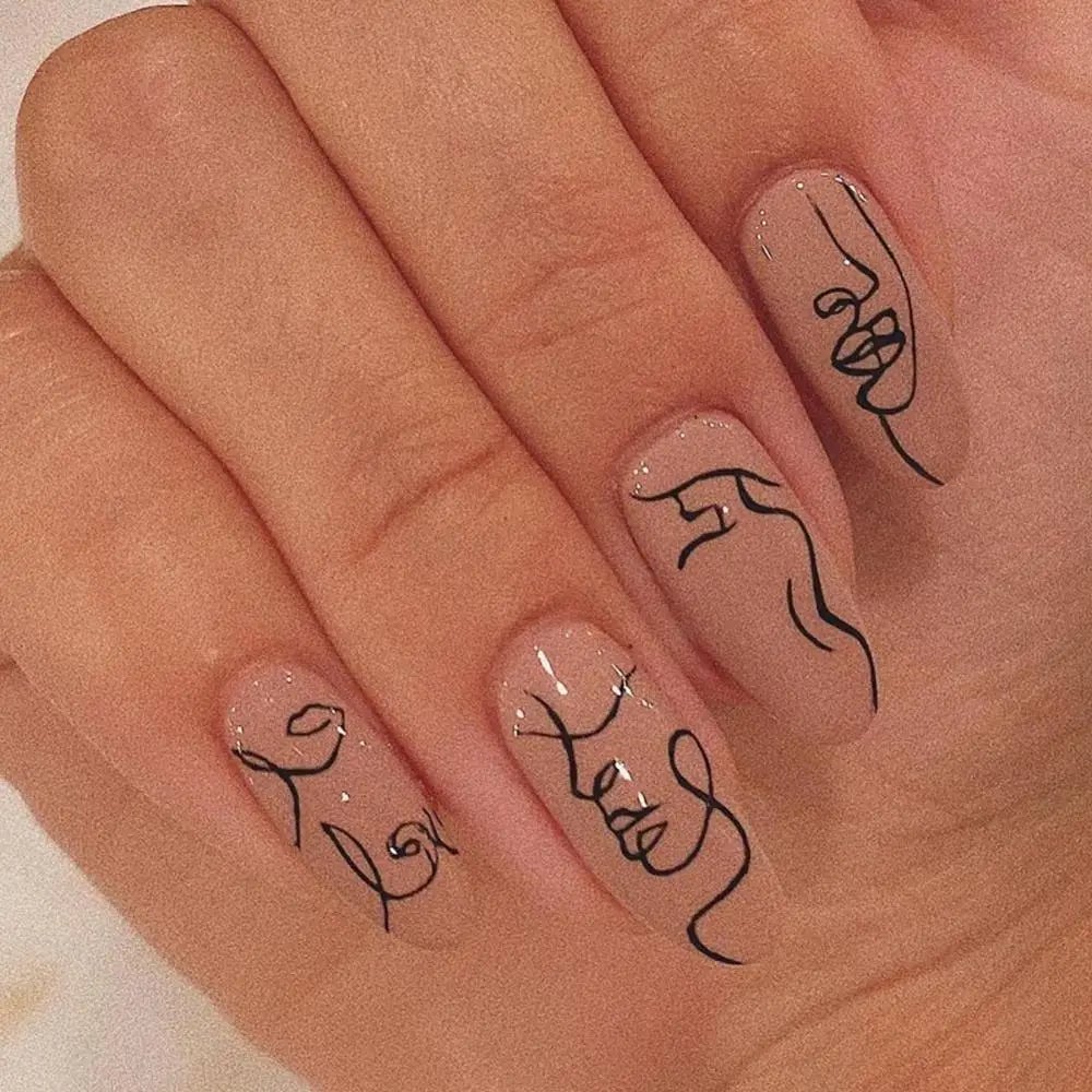 Medium Oval Nude Black Abstract Face Line Art Nails Medium Oval Nude Black Abstract Face Line Art Nails — Line Abstract Nails 2027