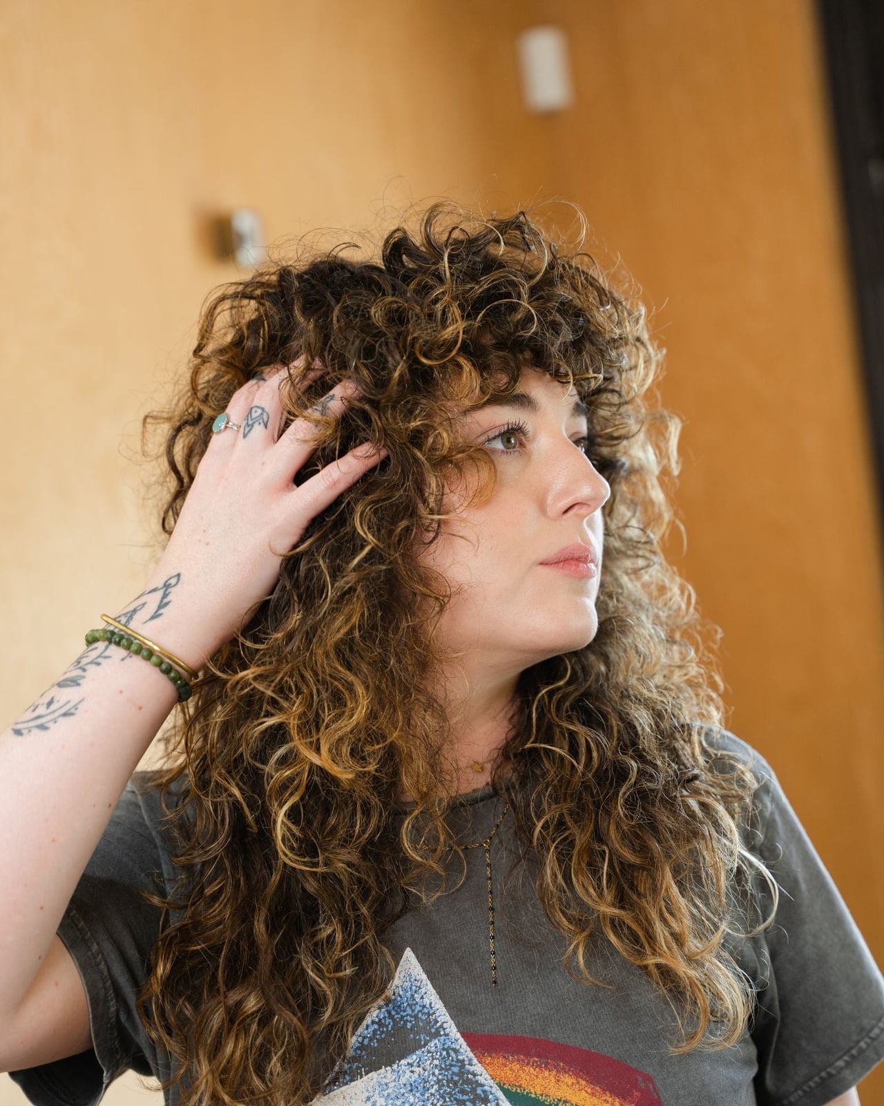 Mid-Back Shag With Full Bangs Mid-Back Shag With Full Bangs — Loose Perm 2027