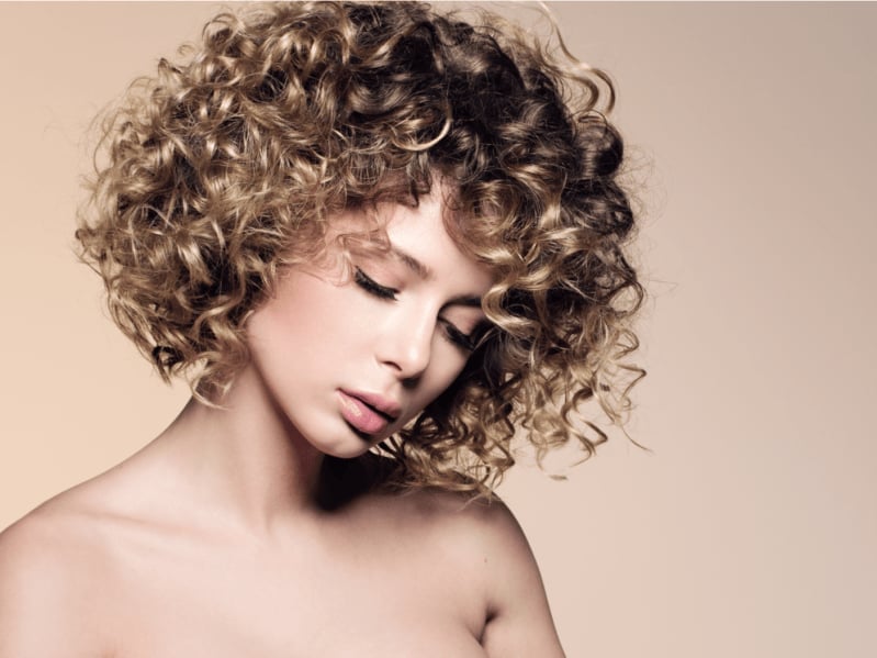 Chin Length Curly Bob With Highlights Chin Length Curly Bob With Highlights — Loose Perm 2027