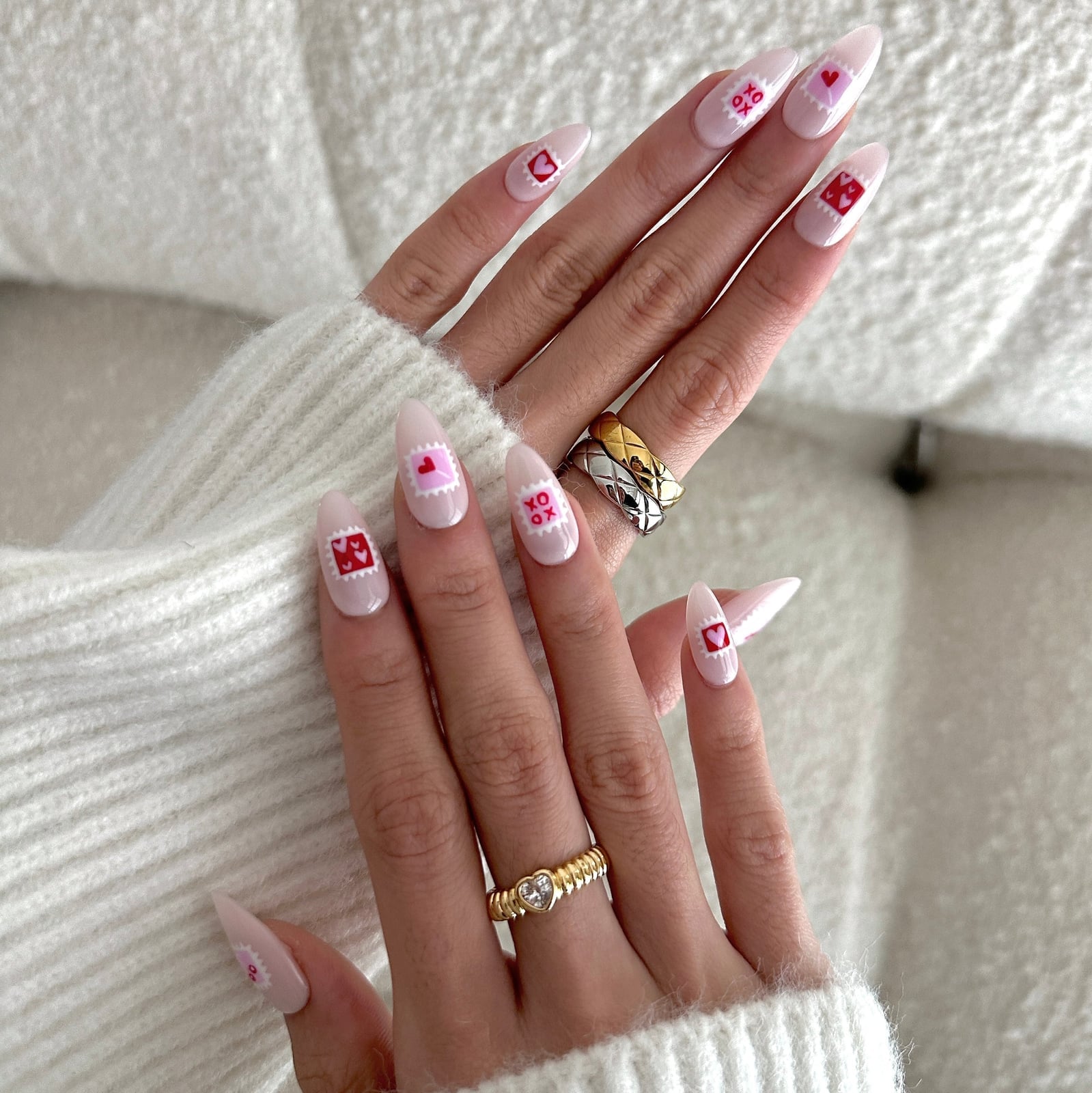 Medium Almond Pale Pink with Stamp Decals, Designs Include Red Hearts Medium Almond Pale Pink with Stamp Decals, Designs Include Red Hearts — Love Letter Nails 2027