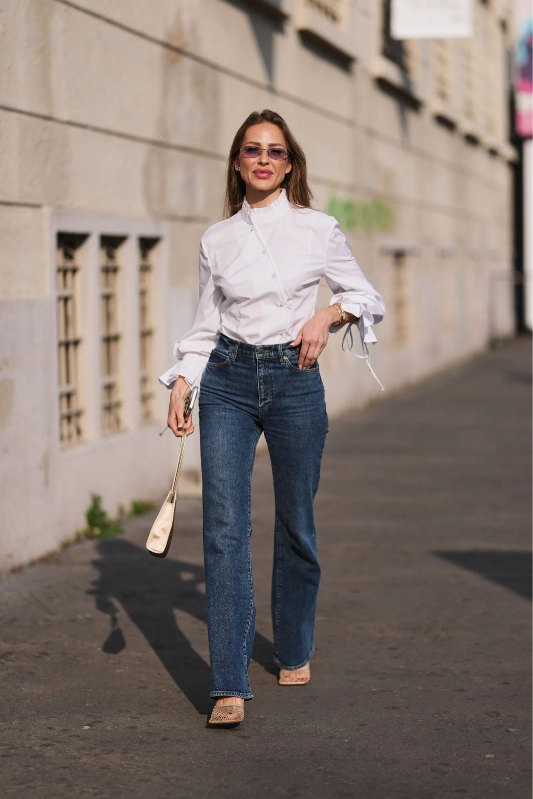 Ruffled Mock Neck Blouse with Wide-Leg Jeans for City Exploration Ruffled Mock Neck Blouse with Wide-Leg Jeans for City Exploration — Italy Outfits 2027