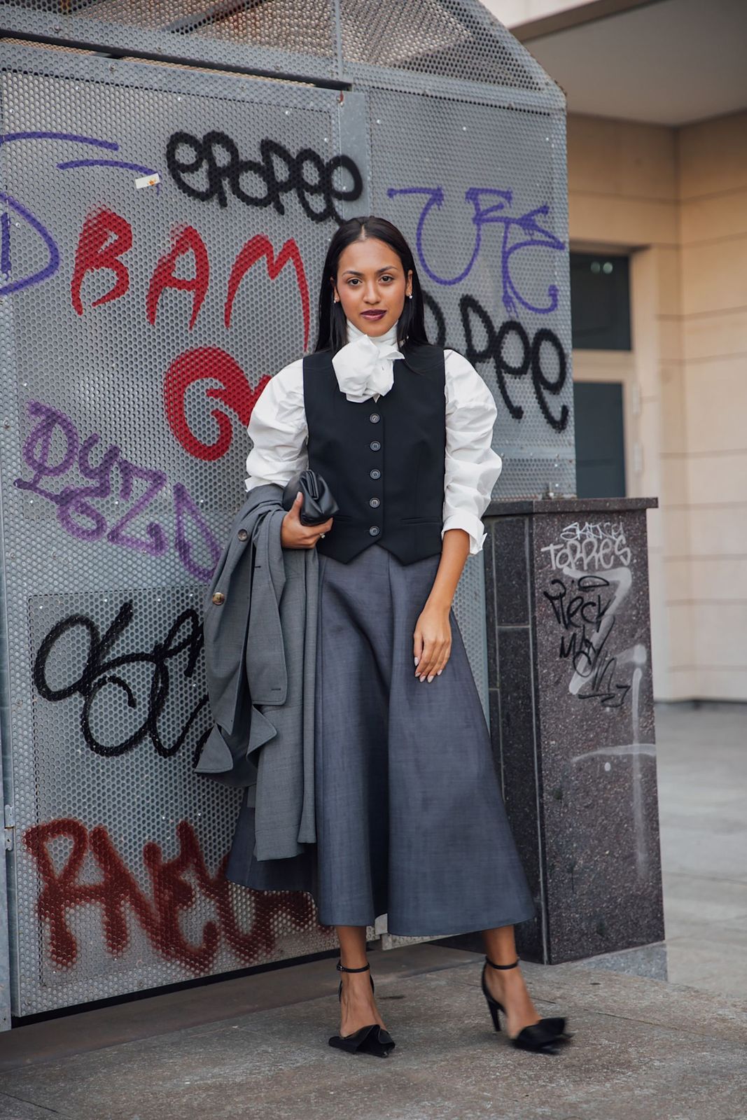 Black Vest with Puff-Sleeve Blouse and Grey Trousers Black Vest with Puff-Sleeve Blouse and Grey Trousers — Vest Outfits 2027
