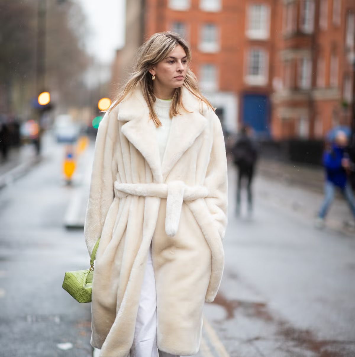 Cream Faux Fur Coat Cinched with a Belt Over White Trousers — Teddy Coat Outfits 2027