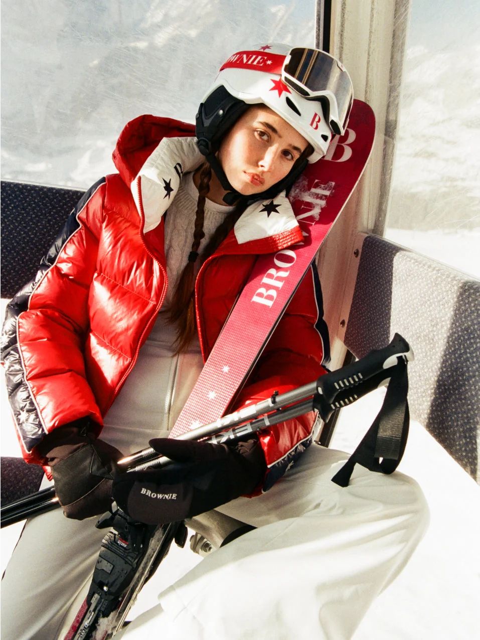 Red Puffer Jacket Over Grey Knit Jumpsuit Red Puffer Jacket Over Grey Knit Jumpsuit — Ski Outfits for Women 2027