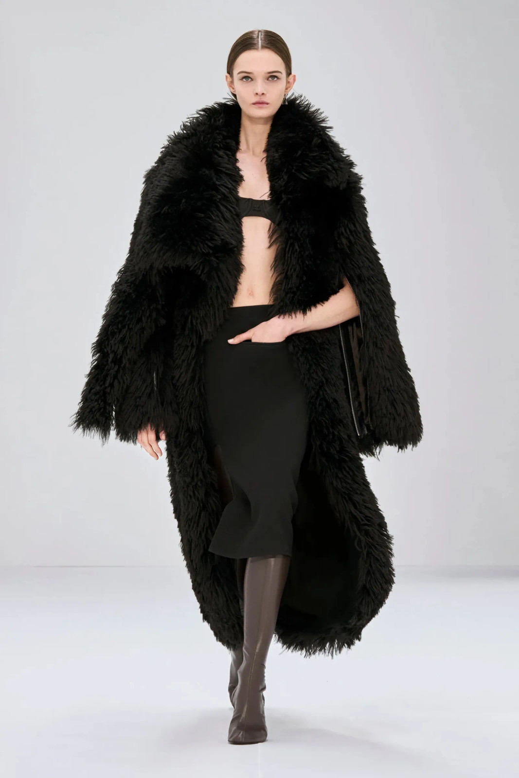 Dramatic Faux Fur Coat Over a Sleek Midi Dramatic Faux Fur Coat Over a Sleek Midi — New Years Eve Outfits 2027