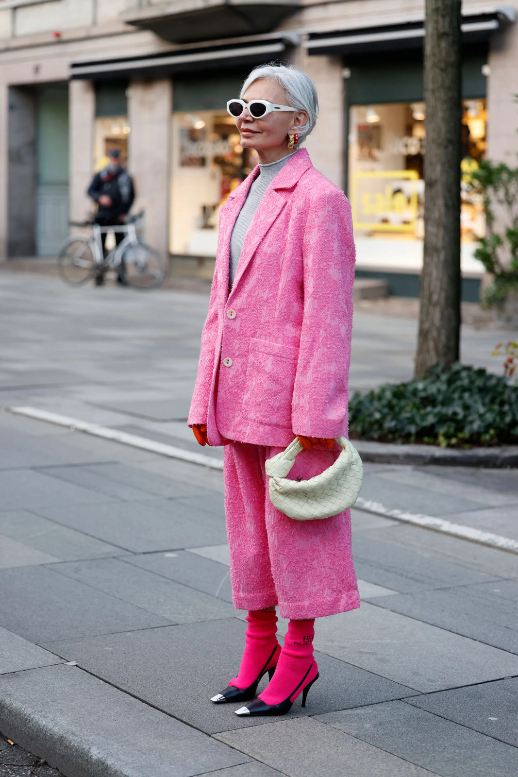 Textured Pink Tweed Suit with Grey Turtleneck and Orange Gloves Textured Pink Tweed Suit with Grey Turtleneck and Orange Gloves — Pink and Red Outfits 2027