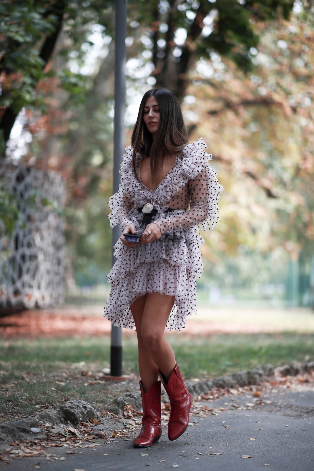 Edgy Ruffled Polka Dot Dress with Cowboy Boots for a Fashion-Forward Look Edgy Ruffled Polka Dot Dress with Cowboy Boots for a Fashion-Forward Look — Ruffle Top Outfits 2027