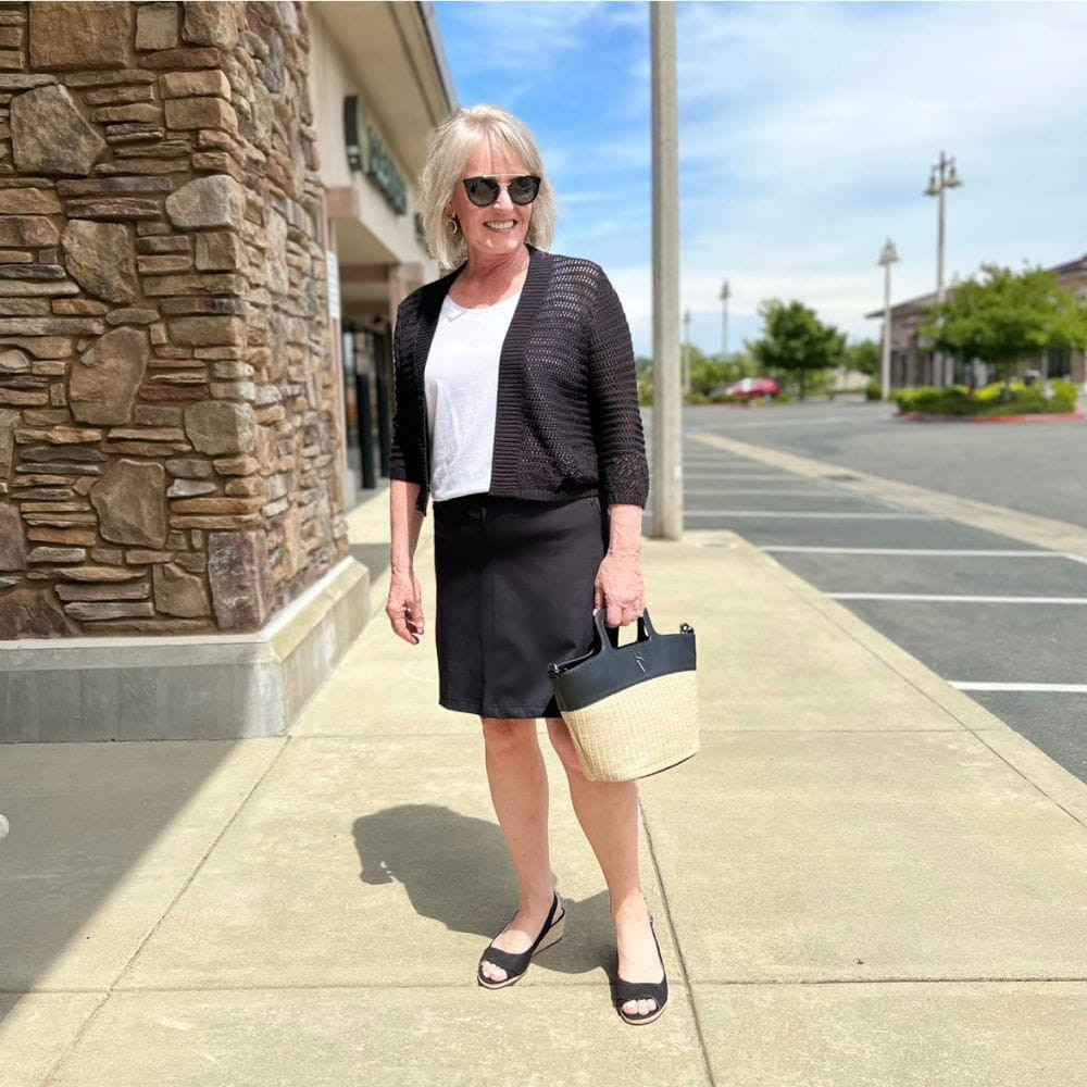 Black Skort with Open-Knit Cardigan and White Tee Black Skort with Open-Knit Cardigan and White Tee — Skort Outfits 2027
