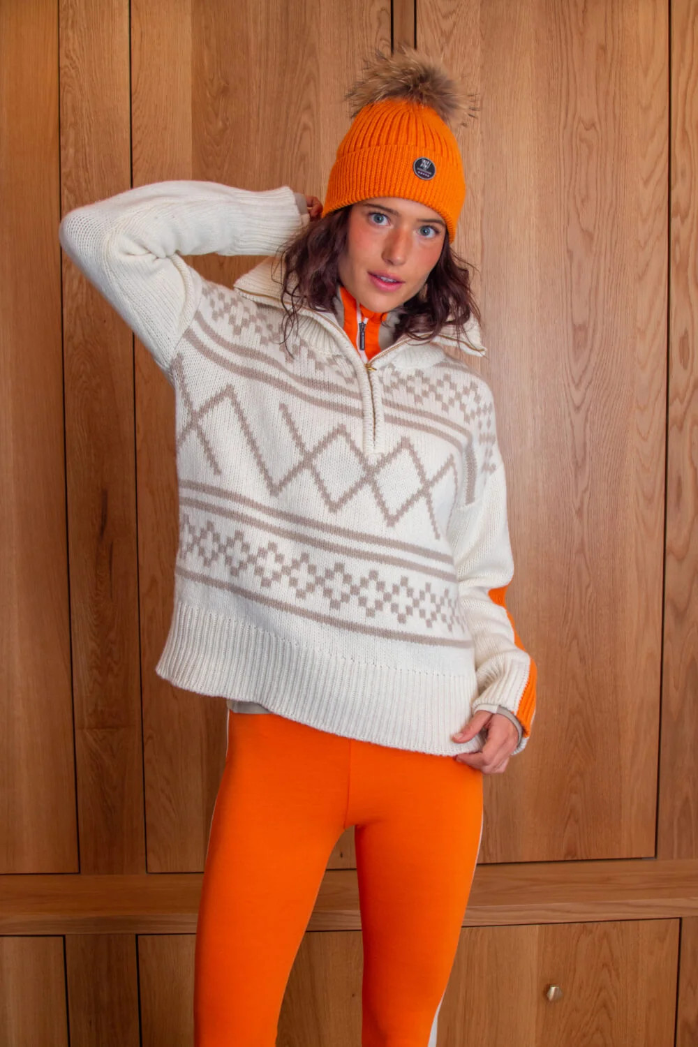Fair Isle Sweater and Bright Orange Leggings Fair Isle Sweater and Bright Orange Leggings — Apres Ski Outfits 2027