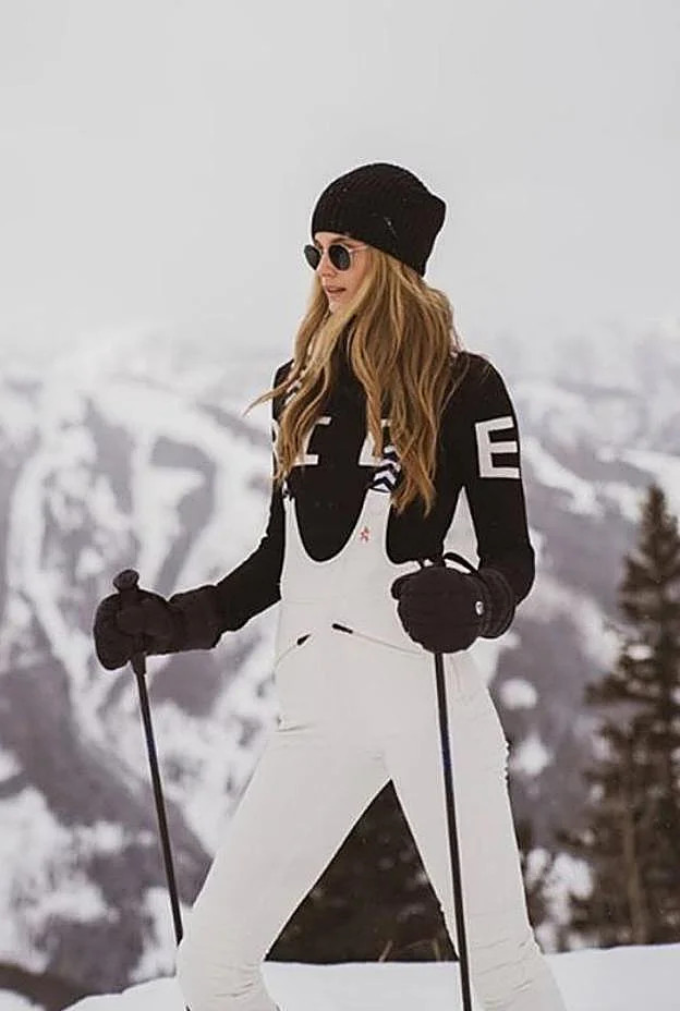 White Ski Overalls with Bold Logo Detail White Ski Overalls with Bold Logo Detail — Apres Ski Outfits 2027