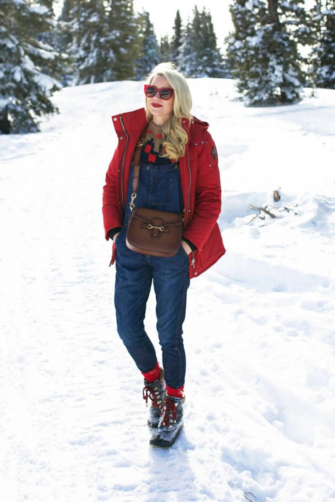 Red Puffer Coat Over Denim Overalls in Snow Red Puffer Coat Over Denim Overalls in Snow — Winter Casual Outfits 2027