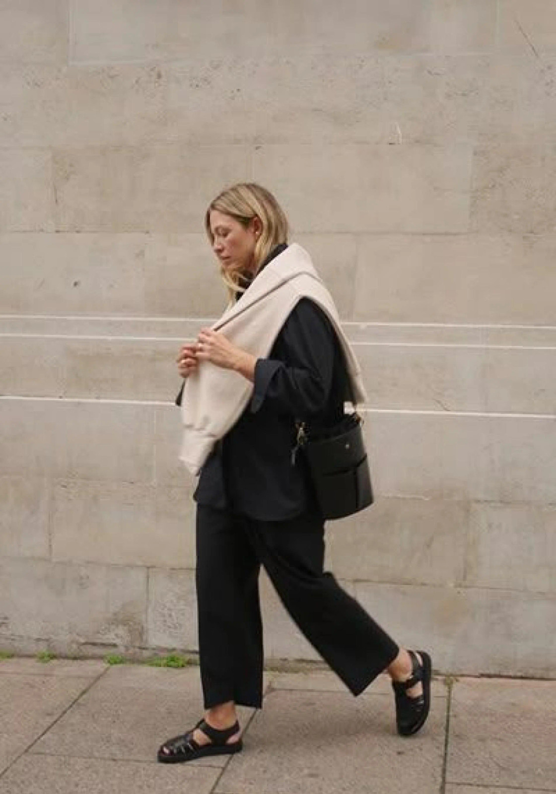 Black Wide-Leg Trousers with Draped Beige Sweater Black Wide-Leg Trousers with Draped Beige Sweater — Summer Outfits 2027 for Women Over 50