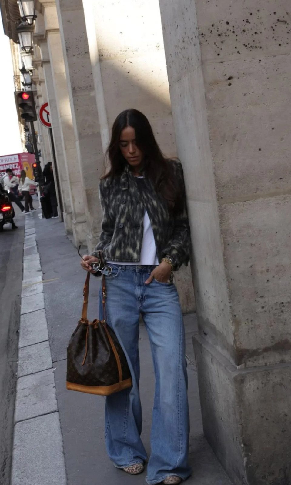 Patterned Jacket and Brown Bucket Bag with Light Wash Jeans — Wide Leg Jeans Outfits 2027