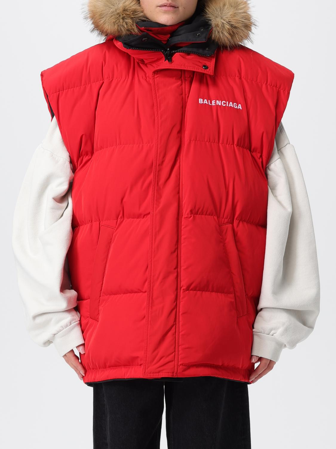 Designer Statement: Red Puffer Vest with Fur Hood and Black Trousers Designer Statement: Red Puffer Vest with Fur Hood and Black Trousers — Puffer Vest Outfits 2027