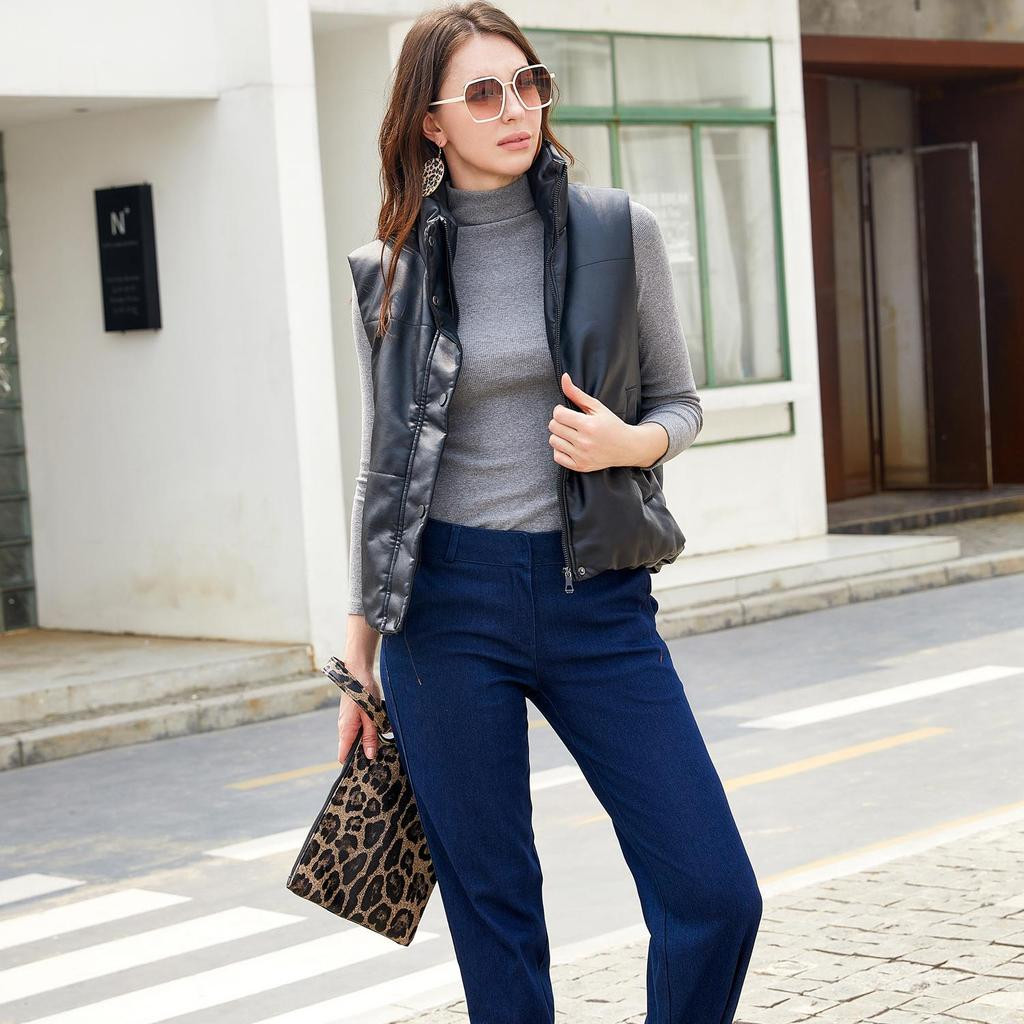 Edgy Texture: Faux Leather Vest with Turtleneck and Dark Denim Edgy Texture: Faux Leather Vest with Turtleneck and Dark Denim — Puffer Vest Outfits 2027