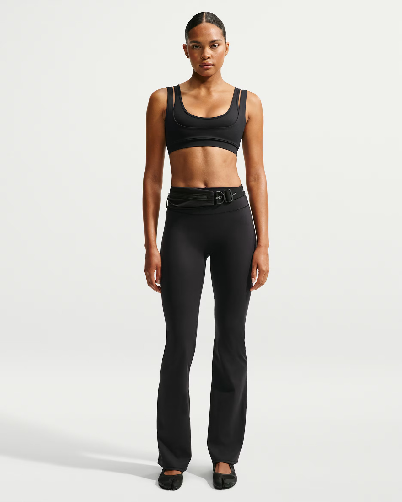 Black Tabi-Style Flats Athletic Style: Black Flare Leggings with Sports Bra and Belt Black Tabi-Style Flats Athletic Style: Black Flare Leggings with Sports Bra and Belt — Flare Leggings Outfits 2027