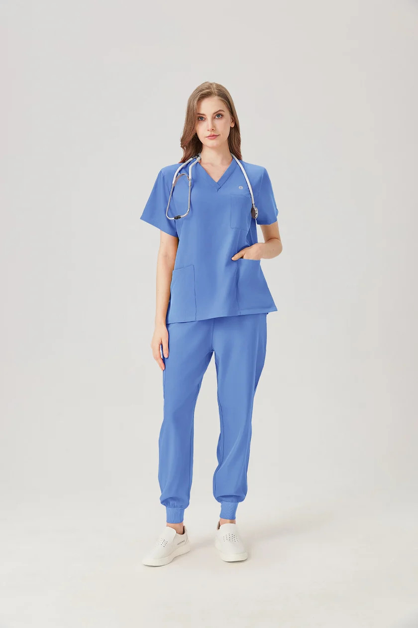Light Blue Relaxed Fit Scrubs with White Sneakers and Stethoscope Light Blue Relaxed Fit Scrubs with White Sneakers and Stethoscope — Scrubs Outfits 2027