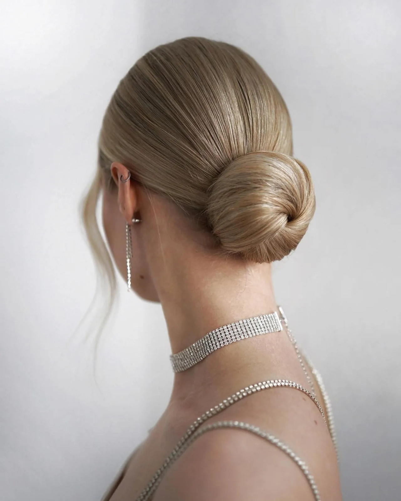 Sleek Ash Blonde Low Bun — Prom Hairstyles 2027
