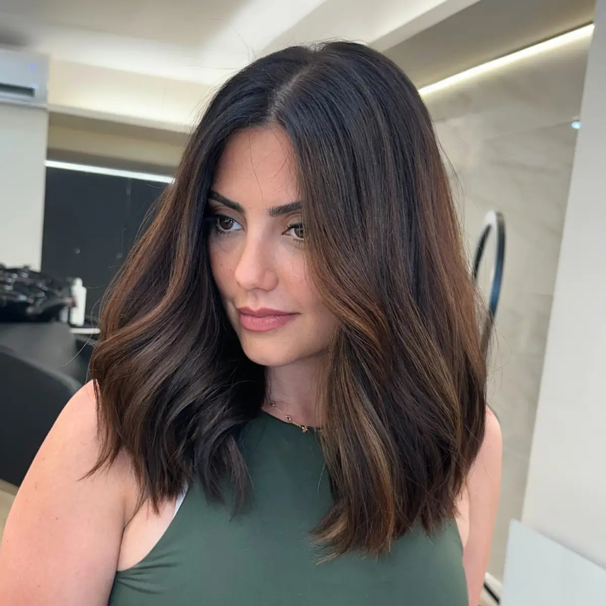 Collarbone Dark Brown Voluminous Waves Collarbone Dark Brown Voluminous Waves — Medium Haircuts 2027