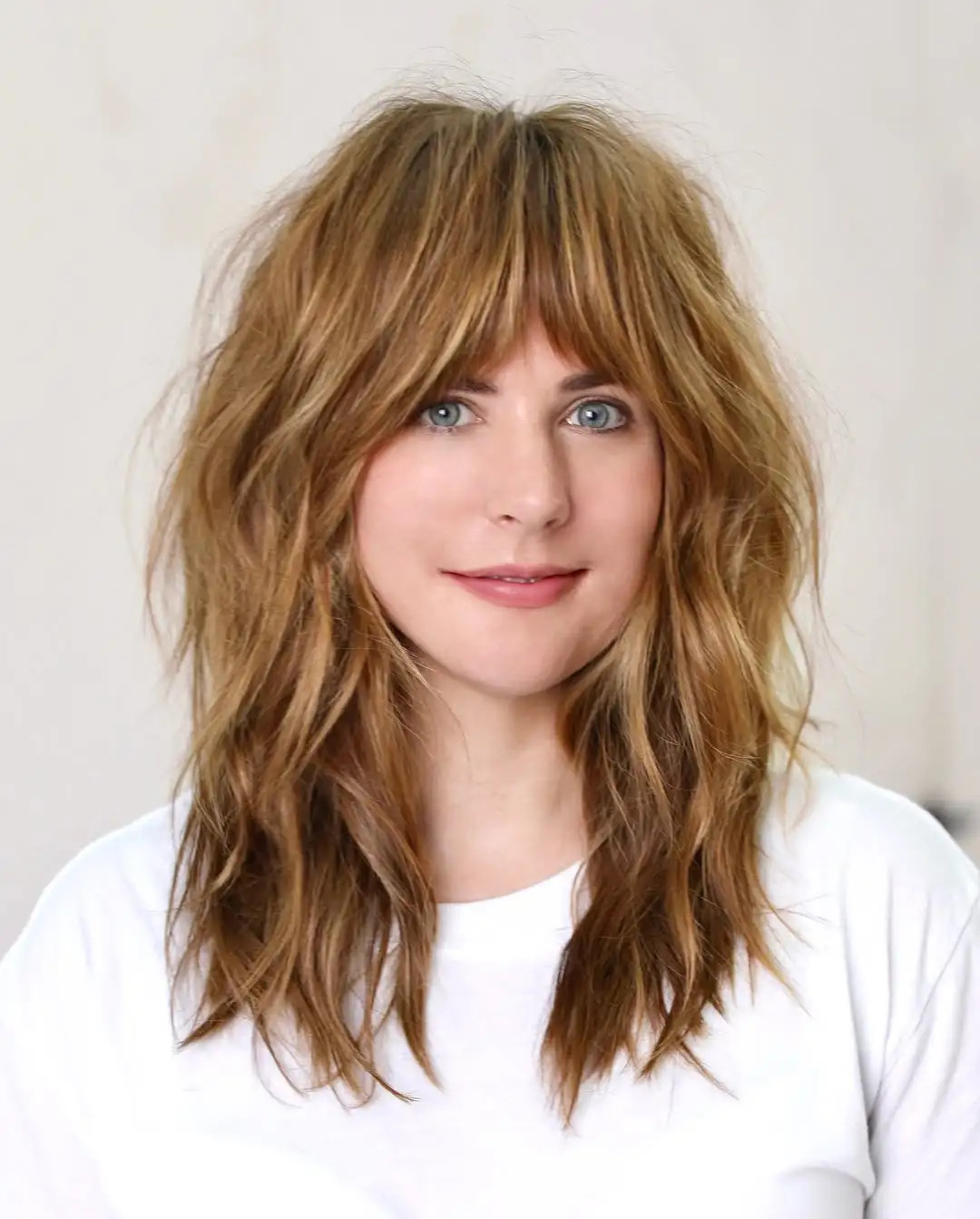 Mid-Back Honey Blonde Shag Mid-Back Honey Blonde Shag — Medium Haircuts 2027