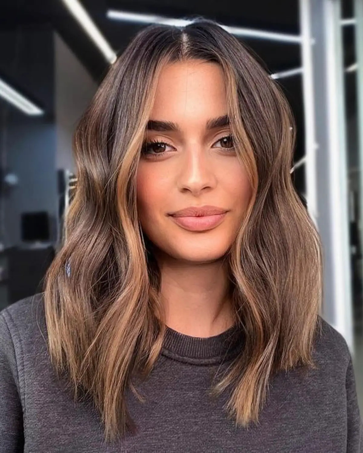 Collarbone Dark Brown Face-Framing Layers Collarbone Dark Brown Face-Framing Layers — Medium Haircuts 2027