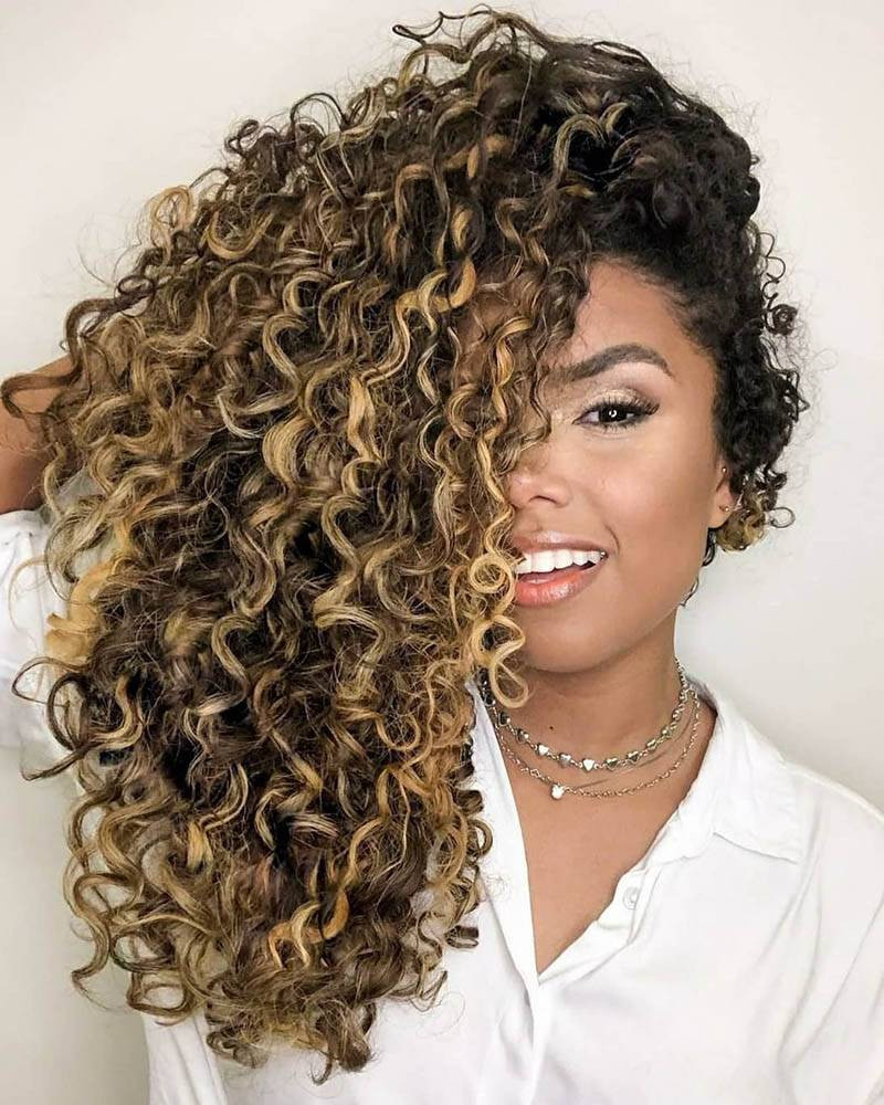 Voluminous Curly Hair With Side-Swept Caramel — Caramel Balayage 2027