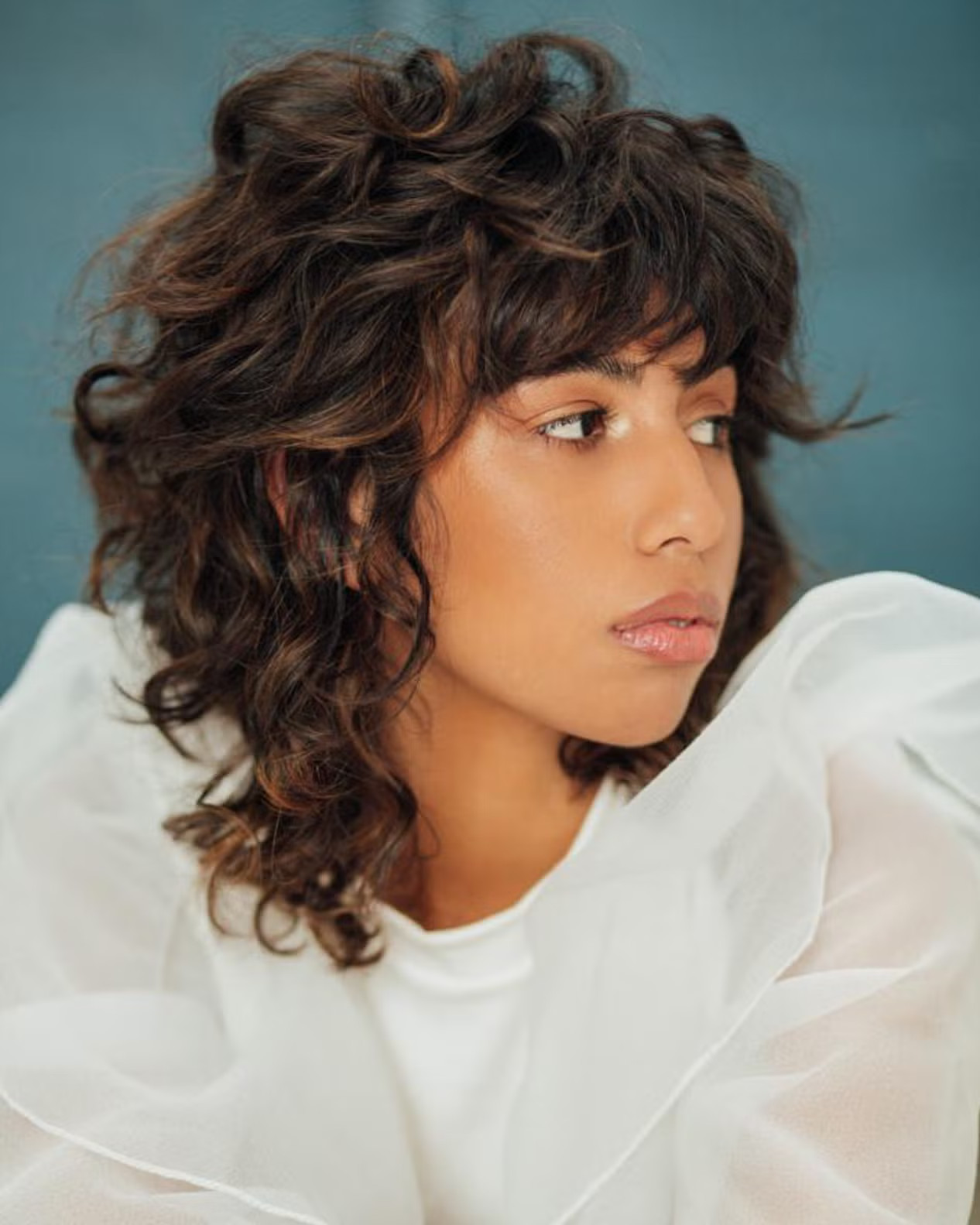 Shoulder Shag With Side Part and Choppy Bangs Shoulder Shag With Side Part and Choppy Bangs — Shag Haircut 2027