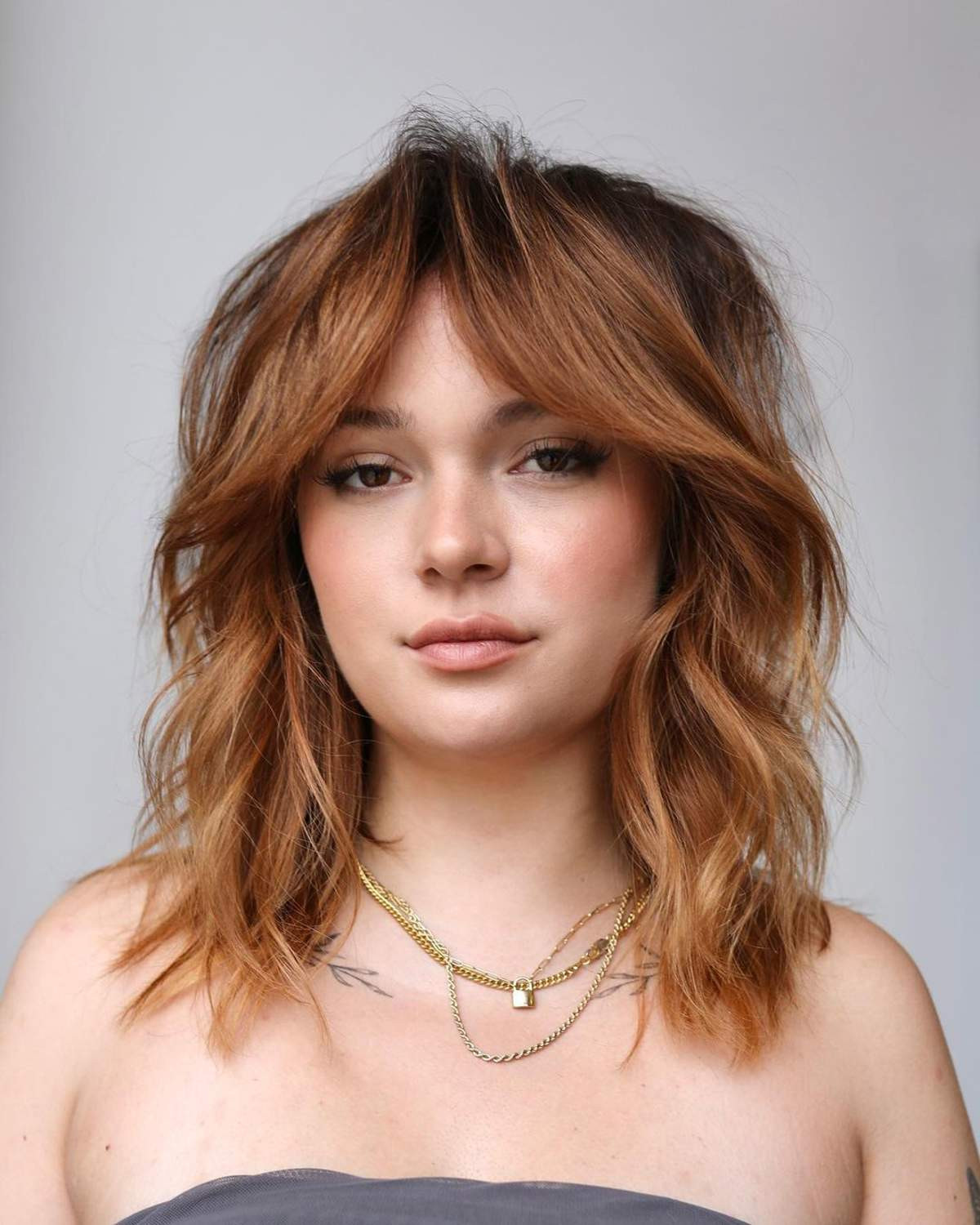 Medium Auburn Shag With Copper Highlights Medium Auburn Shag With Copper Highlights — Hair Color 2027 for Brown Eyes